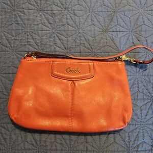 Coach Orange Leather Clutch